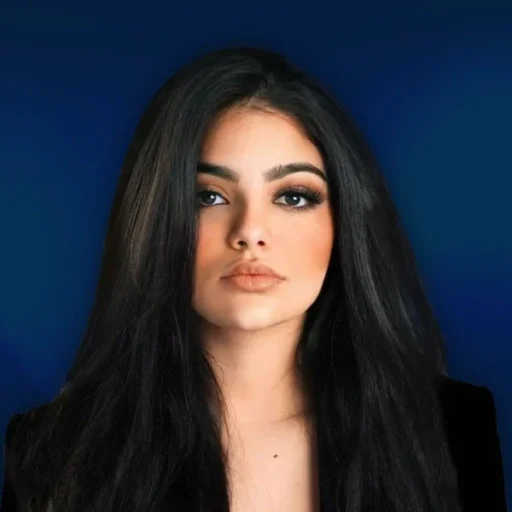 Professional portrait of Haide, Legal & Compliance Specialist at AIWIZ, with long dark hair wearing a black top against a blue background, specialising in legal content and regulatory compliance.