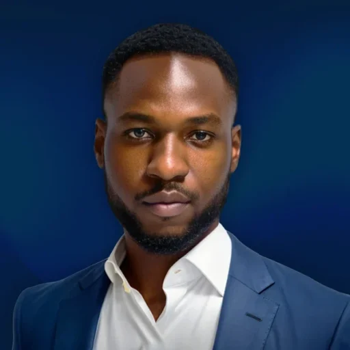 Man in blue suit with dark background
